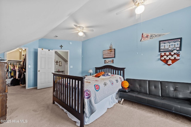2824 Preston Ln, Grimesland, NC 27837 - bedroom featuring carpet, a spacious closet, vaulted ceiling, a ceiling fan, and a closet