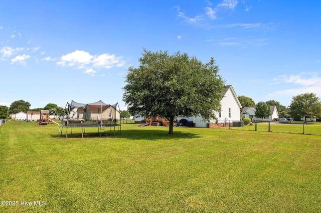 2824 Preston Ln, Grimesland, NC 27837 - view of yard with a trampoline and a playground