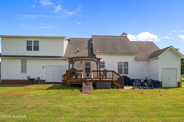 2824 Preston Ln, Grimesland, NC 27837 - rear view of house with a pergola, a wooden deck, a lawn, and a chimney