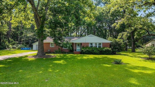 203 James St, Vanceboro, NC 28586 - ranch-style home featuring brick siding, a front lawn, and dirt driveway