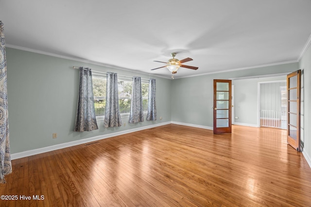 203 James St, Vanceboro, NC 28586 - spare room with french doors, light wood-type flooring, a ceiling fan, and ornamental molding
