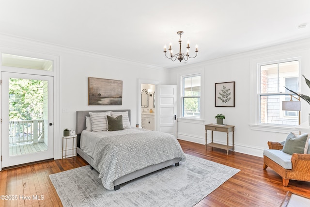 503 S 3rd St, Wilmington, NC 28401 - bedroom with access to outside, a chandelier, hardwood / wood-style floors, and crown molding