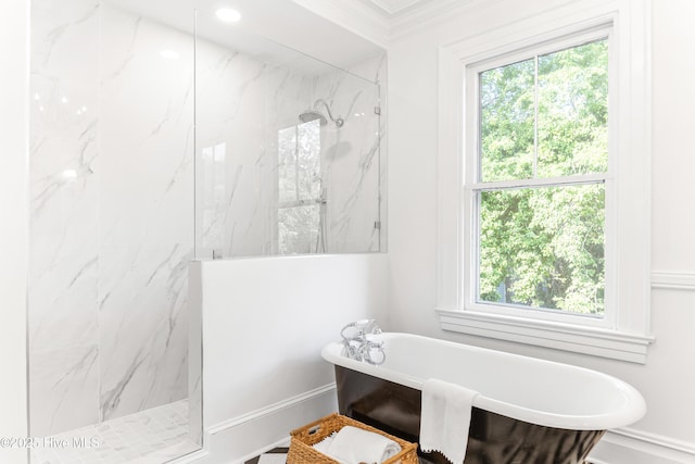 503 S 3rd St, Wilmington, NC 28401 - bathroom featuring healthy amount of natural light, a marble finish shower, a soaking tub, and ornamental molding