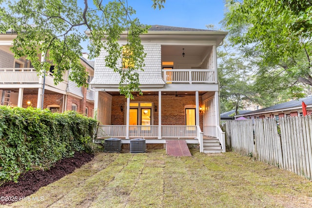 503 S 3rd St, Wilmington, NC 28401 - rear view of property with a balcony, a porch, and brick siding
