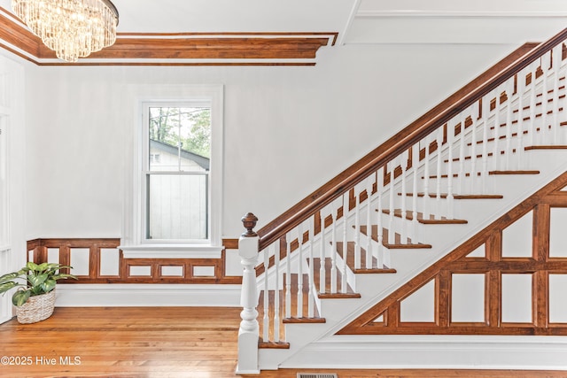 503 S 3rd St, Wilmington, NC 28401 - stairway with a chandelier and wood finished floors