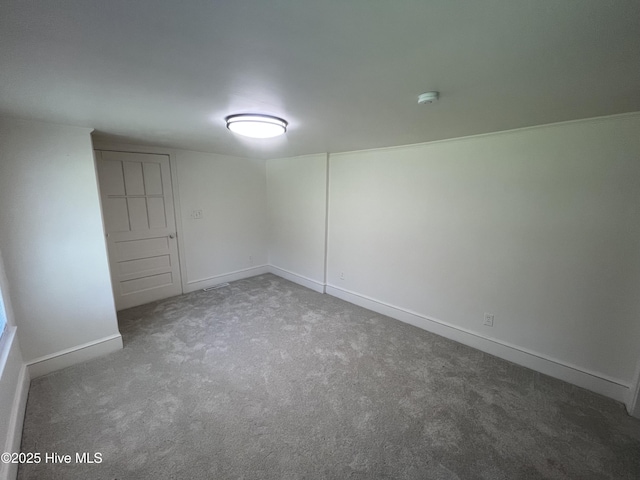 148 N Mitchell Ford Rd, Clarkton, NC 28433 - carpeted empty room with a smoke detector and baseboards