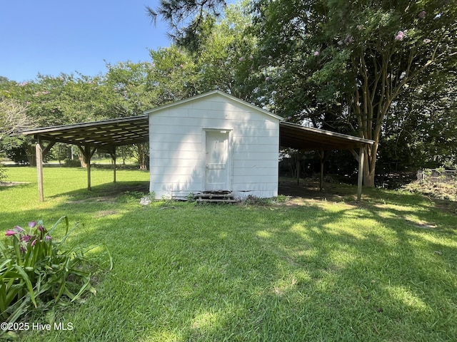 148 N Mitchell Ford Rd, Clarkton, NC 28433 - view of outbuilding featuring a carport