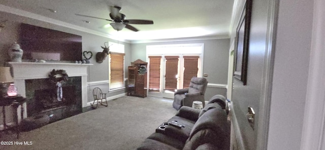3129 Lake Pointe Trl, Rocky Mount, NC 27804 - living area featuring crown molding, carpet floors, a fireplace with flush hearth, and ceiling fan