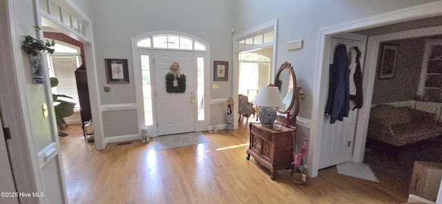 3129 Lake Pointe Trl, Rocky Mount, NC 27804 - entryway featuring light wood-style flooring and a towering ceiling