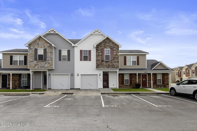 231 Glenhaven Ln, Jacksonville, NC 28546 - multi unit property featuring stone siding, board and batten siding, and uncovered parking
