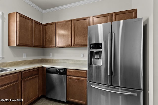 231 Glenhaven Ln, Jacksonville, NC 28546 - kitchen featuring stainless steel appliances, ornamental molding, and light countertops