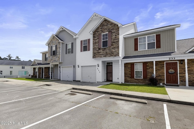 231 Glenhaven Ln, Jacksonville, NC 28546 - view of property featuring stone siding and board and batten siding