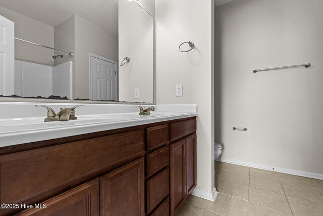 231 Glenhaven Ln, Jacksonville, NC 28546 - bathroom with double vanity, tile patterned floors, and a shower