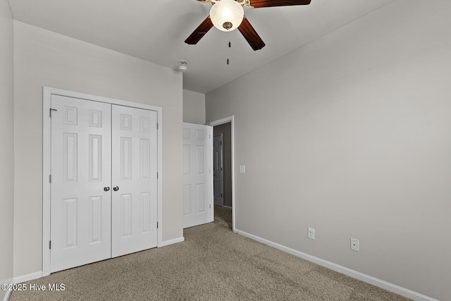 231 Glenhaven Ln, Jacksonville, NC 28546 - unfurnished bedroom with carpet floors, a closet, and a ceiling fan