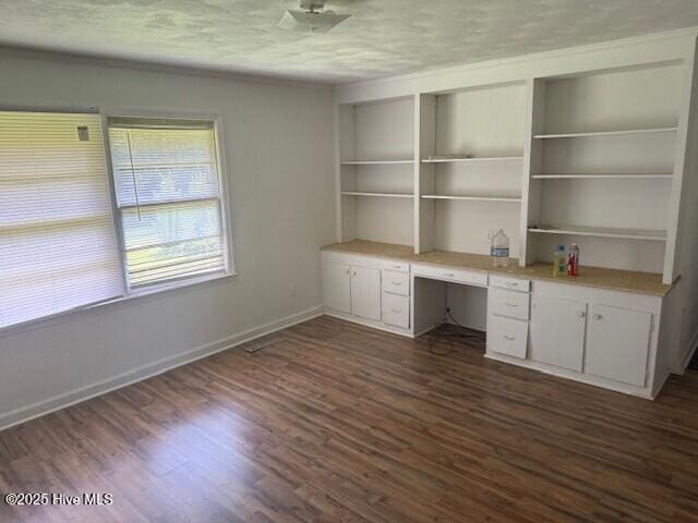 513 Hall Siding Rd, Ahoskie, NC 27910 - unfurnished office with built in study area and dark wood-style flooring