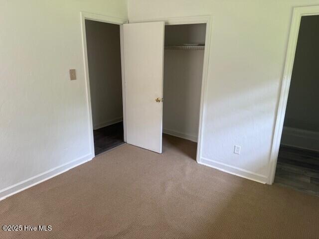 513 Hall Siding Rd, Ahoskie, NC 27910 - unfurnished bedroom with carpet and a closet