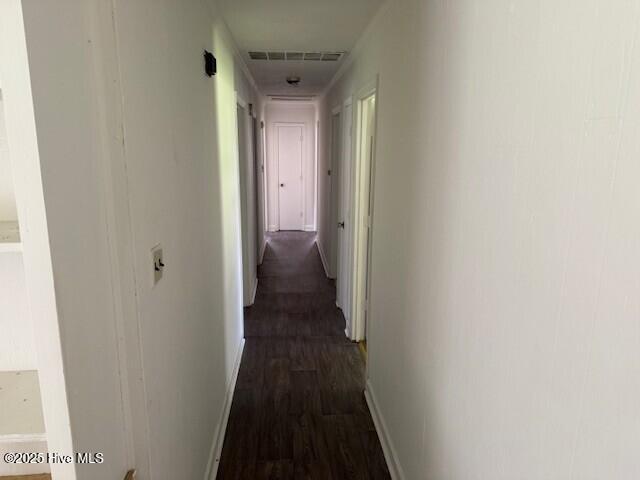 513 Hall Siding Rd, Ahoskie, NC 27910 - corridor with baseboards and dark wood-style flooring