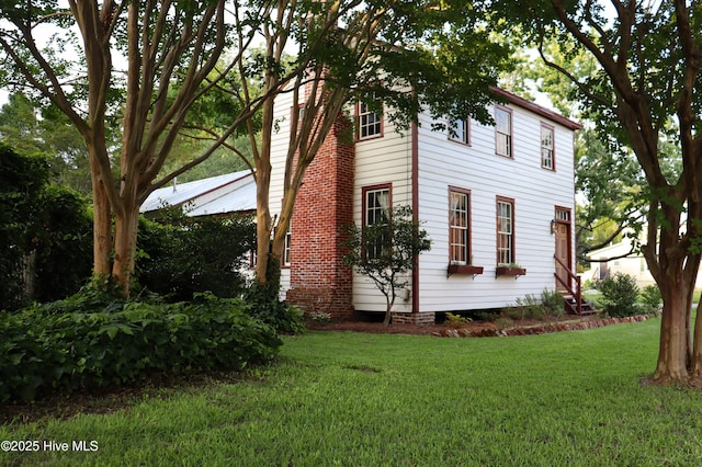 212 Carteret St, Bath, NC 27808 - view of property exterior with a yard
