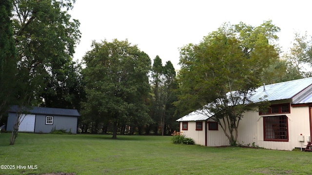 212 Carteret St, Bath, NC 27808 - view of grassy yard featuring an outdoor structure