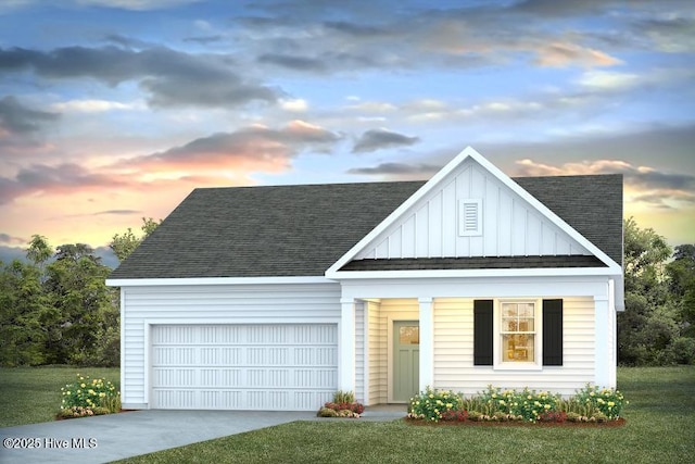 6353 Rye Grass Rd Lot 458, Castle Hayne, NC 28429 - view of front of home featuring concrete driveway, board and batten siding, roof with shingles, a garage, and a front yard