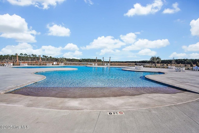 6353 Rye Grass Rd Lot 458, Castle Hayne, NC 28429 - community pool featuring a patio area