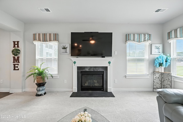 129 Glenmoor Path, Moyock, NC 27958 - living room with carpet floors and a fireplace with flush hearth