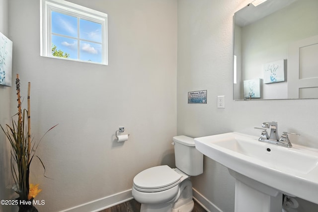 129 Glenmoor Path, Moyock, NC 27958 - bathroom featuring toilet and wood finished floors