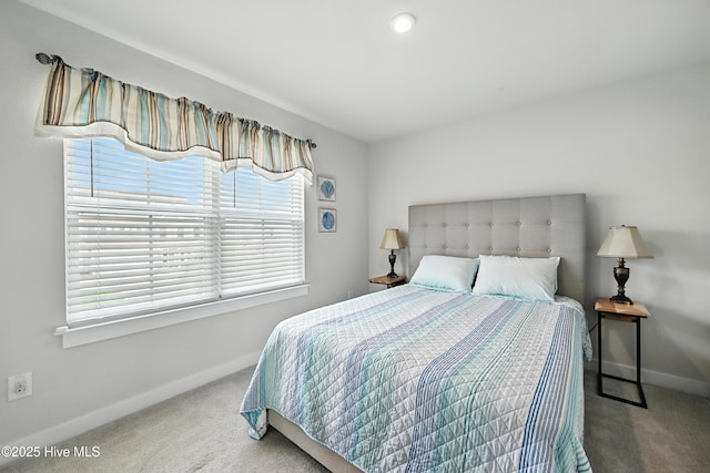 129 Glenmoor Path, Moyock, NC 27958 - carpeted bedroom featuring baseboards