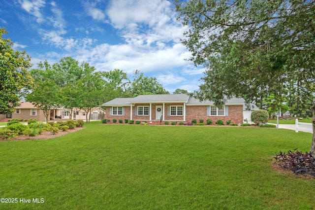 2704 Forrest Dr, Kinston, NC 28504 - single story home featuring a front yard and brick siding
