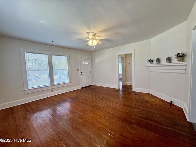 603 E 8th St, Washington, NC 27889 - unfurnished living room featuring wood finished floors and a ceiling fan