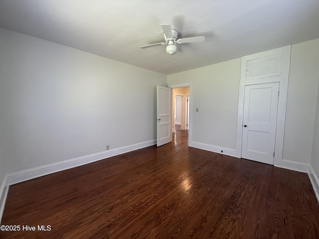 603 E 8th St, Washington, NC 27889 - unfurnished bedroom with dark wood finished floors and ceiling fan