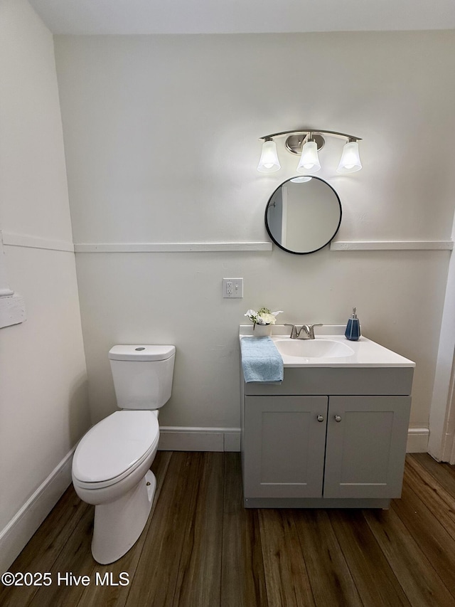 603 E 8th St, Washington, NC 27889 - bathroom featuring wood finished floors and vanity