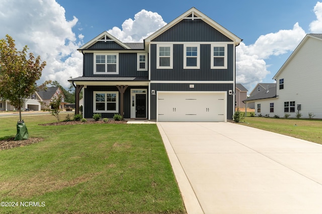 301 Glassmine Trl Unit 48, Aberdeen, NC 28315 - craftsman house with board and batten siding, a front yard, driveway, and an attached garage