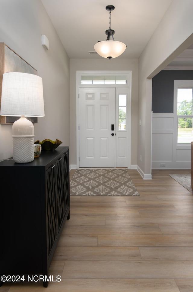 301 Glassmine Trl Unit 48, Aberdeen, NC 28315 - entryway with light wood finished floors and baseboards