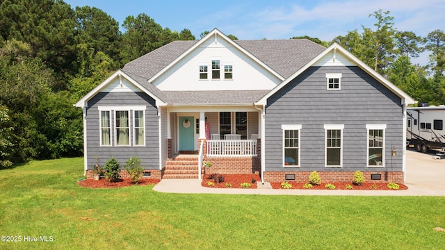 145 Beechnut Ave, South Mills, NC 27976 - view of front of house featuring covered porch, crawl space, a front lawn, and a shingled roof