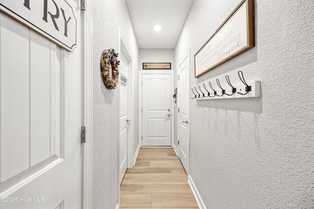 145 Beechnut Ave, South Mills, NC 27976 - doorway with light wood-type flooring, a textured wall, and recessed lighting