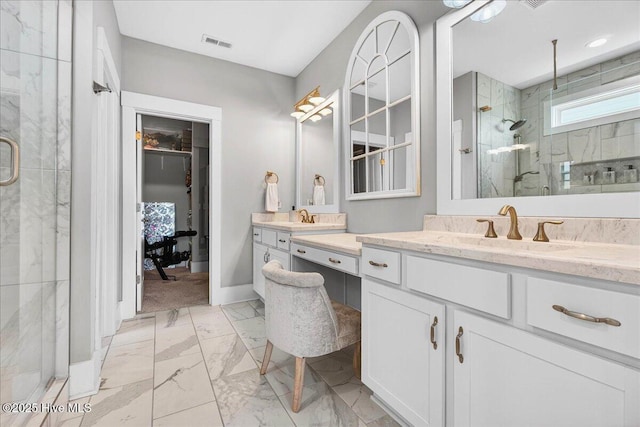 385 Summerhouse Dr, Holly Ridge, NC 28445 - bathroom with a marble finish shower, marble look tiles, and vanity