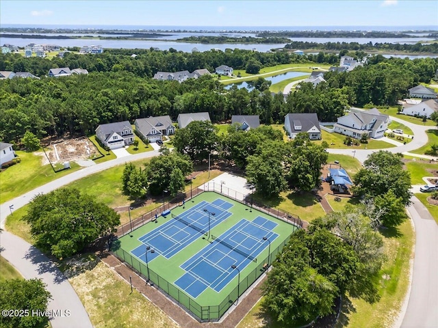 385 Summerhouse Dr, Holly Ridge, NC 28445 - aerial view of residential area with a nearby body of water