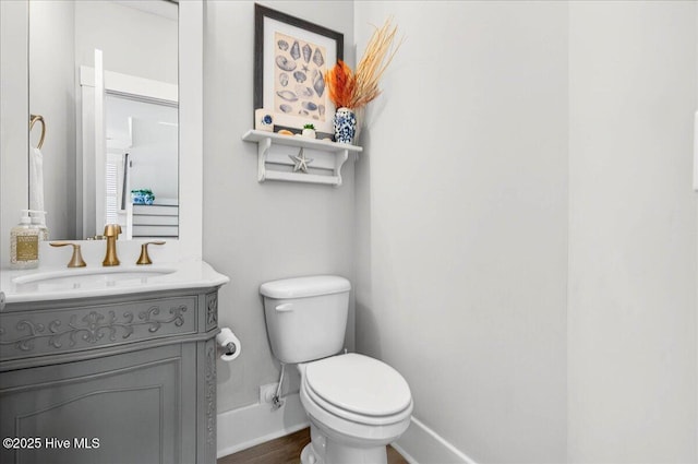 385 Summerhouse Dr, Holly Ridge, NC 28445 - bathroom featuring vanity and wood finished floors