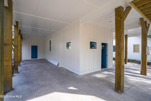 337 NE 48th St, Oak Island, NC 28465 - view of patio featuring an attached carport