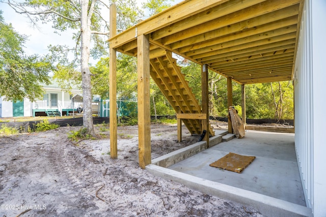 337 NE 48th St, Oak Island, NC 28465 - view of patio / terrace with stairs