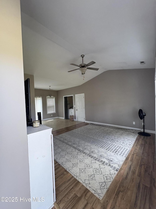 117 Boysenberry Fields Rd, Maple Hill, NC 28454 - living room with dark wood-style floors, a ceiling fan, and lofted ceiling