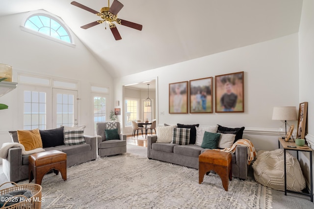 4409 Pinehurst Dr N, Wilson, NC 27896 - living area featuring high vaulted ceiling, healthy amount of natural light, and a ceiling fan