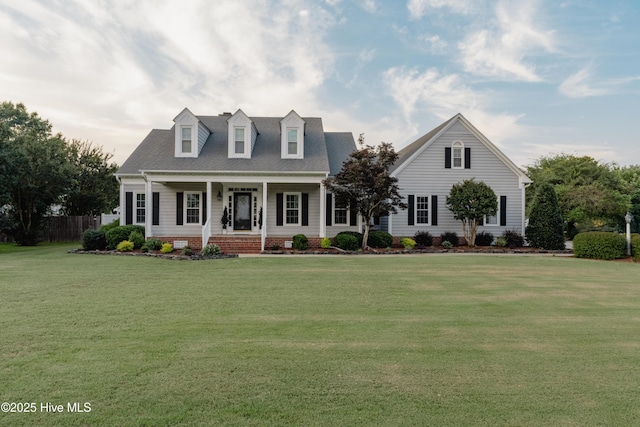 4409 Pinehurst Dr N, Wilson, NC 27896 - cape cod-style house featuring covered porch