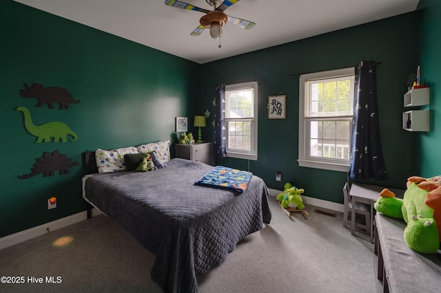 4409 Pinehurst Dr N, Wilson, NC 27896 - carpeted bedroom with baseboards and ceiling fan