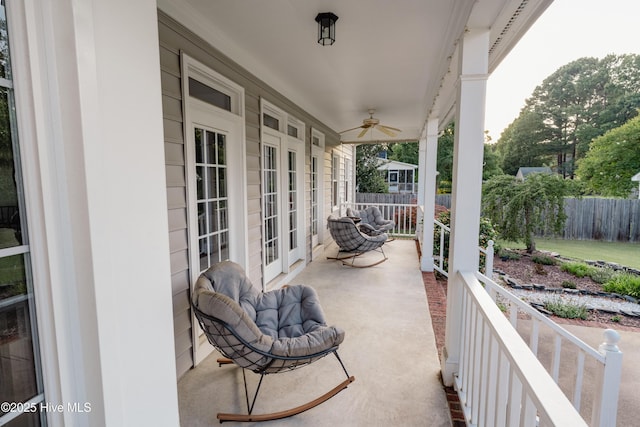 4409 Pinehurst Dr N, Wilson, NC 27896 - covered porch with ceiling fan and french doors