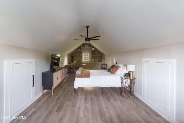 4409 Pinehurst Dr N, Wilson, NC 27896 - bedroom featuring light wood-style flooring and vaulted ceiling