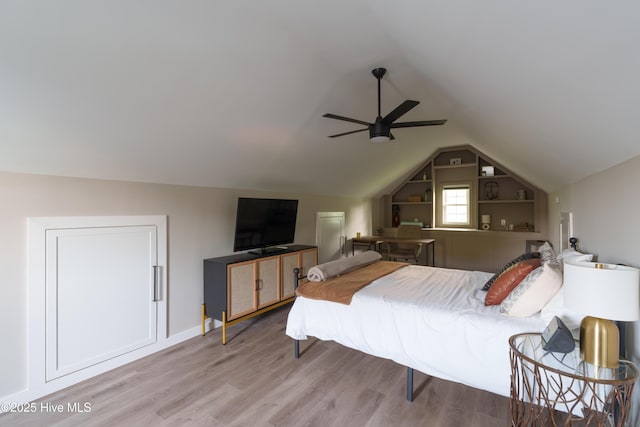 4409 Pinehurst Dr N, Wilson, NC 27896 - bedroom with wood finished floors, vaulted ceiling, and a ceiling fan