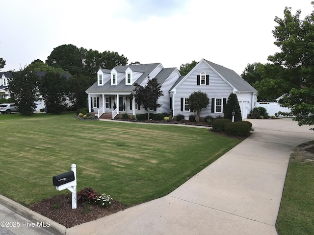 4409 Pinehurst Dr N, Wilson, NC 27896 - new england style home featuring a porch, a front lawn, driveway, and an attached garage