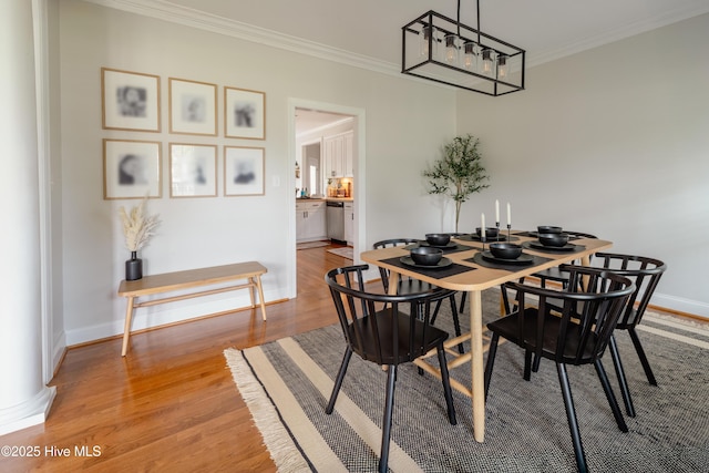 4409 Pinehurst Dr N, Wilson, NC 27896 - dining area with light wood-type flooring and crown molding